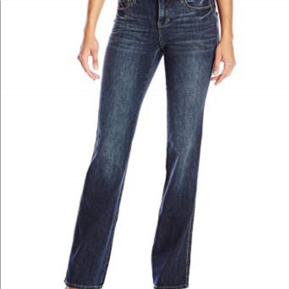 DKNY PARK AVENUE STILETTO LOW RISE BOOT CUT FIVE POCKET MEDIUM WASH JEANS